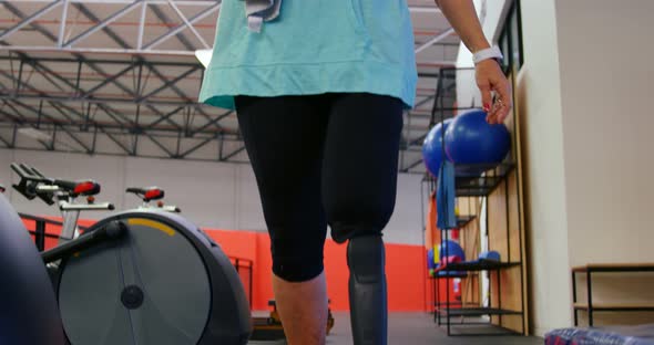 Senior woman drinking water while walking 4k