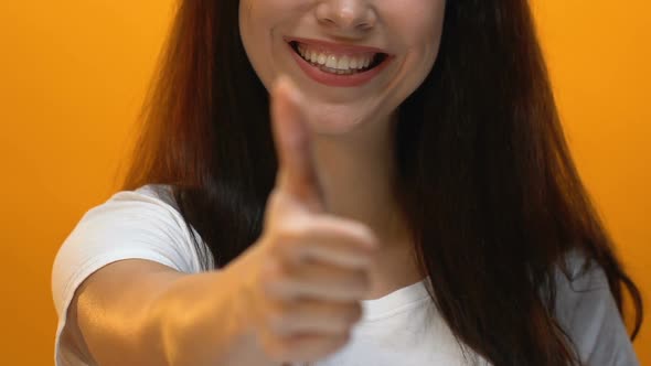 Happy Smiling Girl Showing Thumbs-Up Gesture, Positive Thinking, Like, Close Up