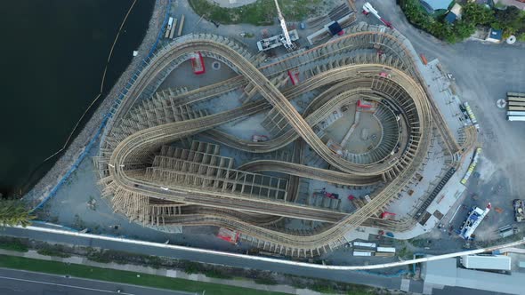 Slow spriraling view of rollercoaster construction at themepark