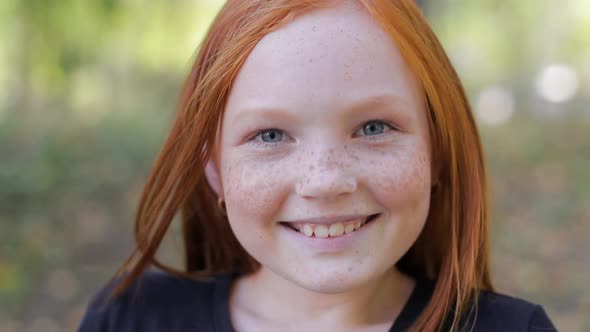 Natural Appearance of a Girl with Beautiful Freckles on Her Face
