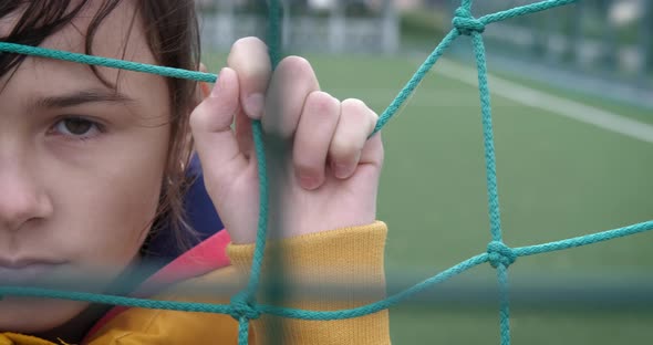 Girl By Empty Sport Ground