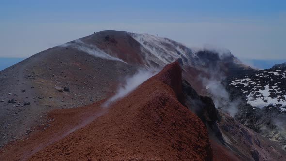 Silhouette of Man Hiking at Coldera of Avachinsky Stratovolcano Also Known As Avacha Volcano