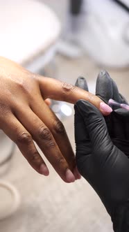 African Girl Doing Manicure in a Beauty Salon