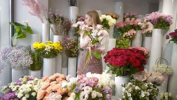 Inspired Woman in a Fresh Flower Warehouse