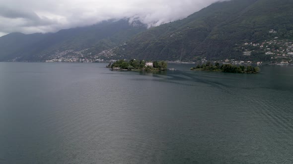 Low orbit shot over lake maggiore and the famous island Brissago, Switzerland