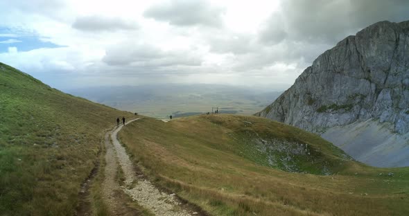 Ultrawide View on the Footpath on Savin Kuk Mountain Top on a Cloudy Windy Day in Durmitor National