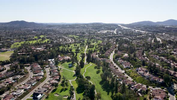 Aerial View of Golf in Residential Neighborhood in an Diego County