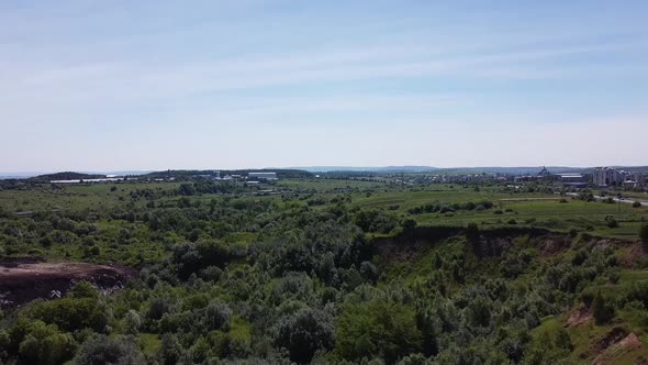 Aerial drone view of a flying over the rural agricultural landscape.