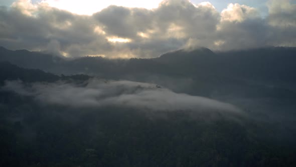 Drone Over Morning Clouds Over Forests And Mountain