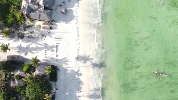 Vertical Video of the Ocean Near the Coast of Zanzibar Tanzania Aerial View