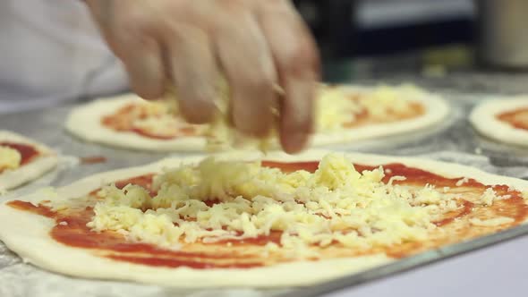 Cook Making Italian Pizza