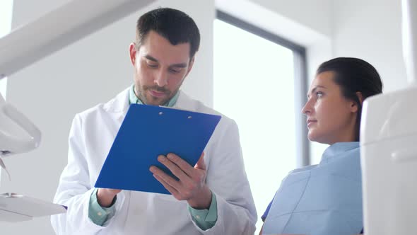 Dentist and Patient Talking at Dental Clinic 1