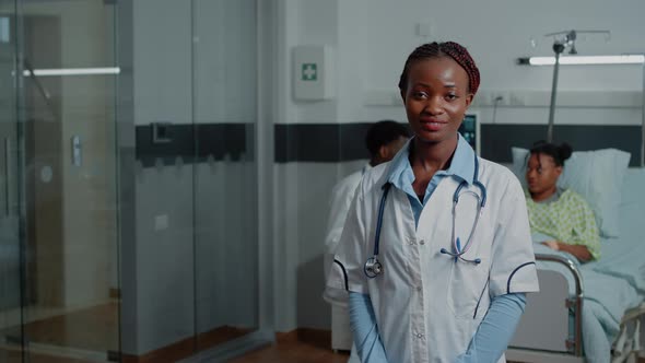 Portrait of Doctor with Stethoscope and White Coat