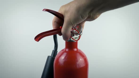 Fire Extinguisher Is Picked Up Moving Shot