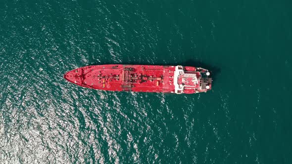 Container Vessel Anchored in the Port Aerial Top View