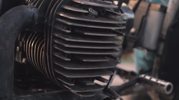 Details of Custom Motorcycle at Sunset on the Street