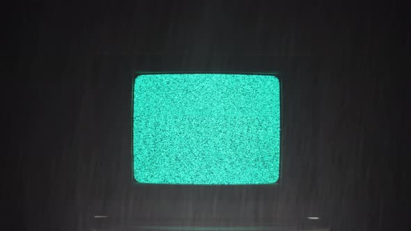 Old Retro Television on Black Background with Rain Storm