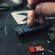 Man Solder the Electronic Printed Circuit Board - VideoHive Item for Sale