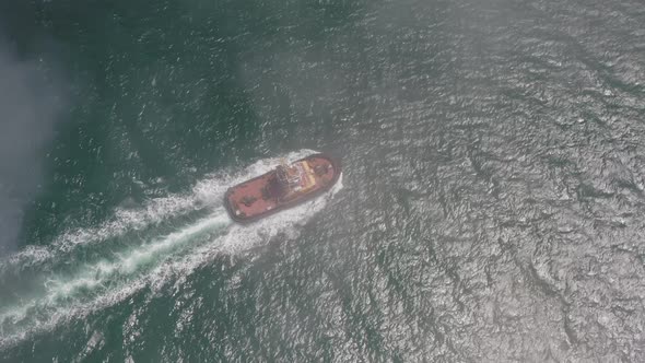 Drone View of the a Tugboat in Motion