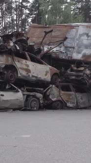 Vertical Video of a Dump of Destroyed Cars During the War in Ukraine