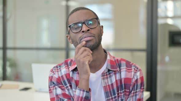 Portrait of Pensive African Man Thinking