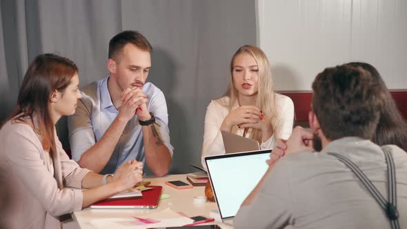 Woman Is Talking Idea Inside Company of Her Colleagues in Meeting in Office