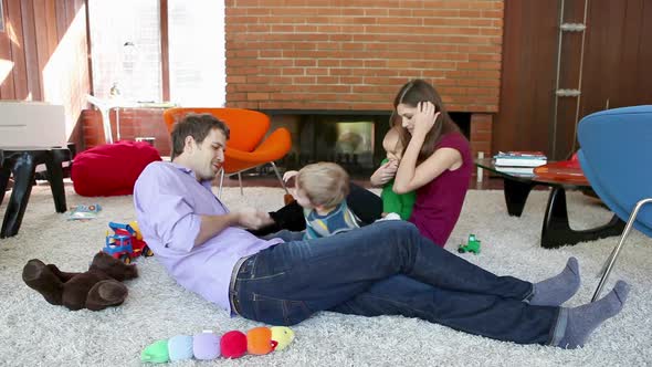 Family playing in living room