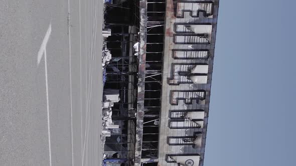 Vertical Video of a Burned Down Shopping Center in Bucha Ukraine During the War