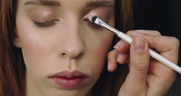 Closeup of Perfect Nude Makeup Process for Young Female Model