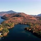 Aerial flythrough over Lake Placid and Mountains during Autumn Fall Colors in New England - VideoHive Item for Sale