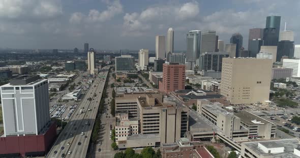 This video is about an establishing aerial shot of downtown Houston skyline on a cloudy day This vid