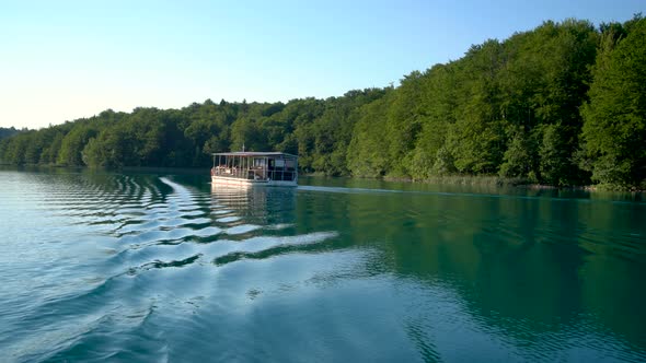 Tourists Travel on Boat in Plitvice Lakes Croatia