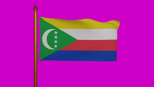 National flag of Comoros waving with flagpole on chroma key, Union of the Comoros flag textile