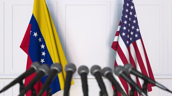 Flags of Venezuela and the United States at International Meeting alt
