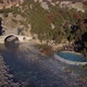 Drone view of people swimming and bathing in hot springs - VideoHive Item for Sale