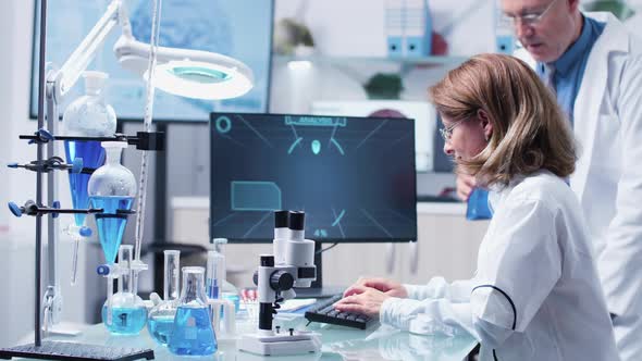 In Modern Research Lab Two Scientists Are Debating alt