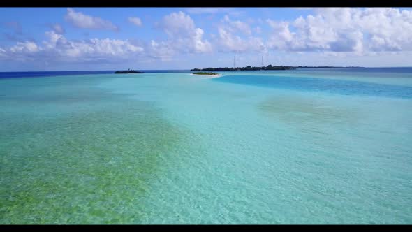 Aerial above panorama of tranquil coast beach vacation by transparent water and clean sandy backgrou