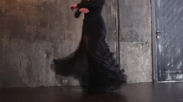 Passionate Female Dancer in a Black Dress