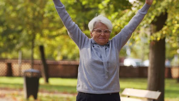 Senior Caucasian Woman Doing Gymnastics Outside Healthy Lifestyle Elderly People Wellness Support