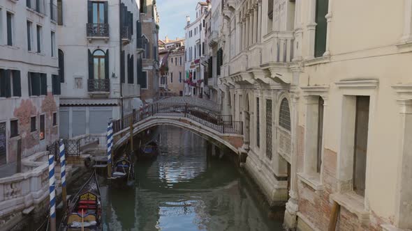 Canal Bridges and Old Historical Buildings of Venice Early in the Morning Without People