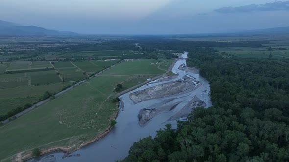 Flying over Alazani river at sunset. Kvareli, Georgia 2022 summer