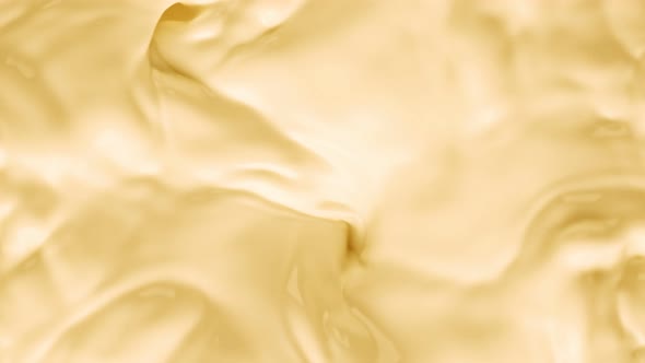 Super Slow Motion Shot of Swirling Yellow Milky Wortex at 1000Fps