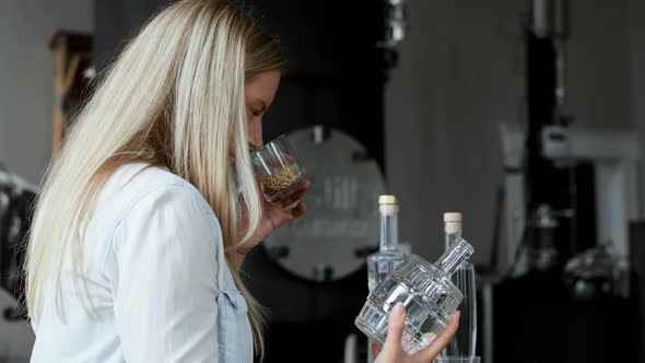 Female worker working in distillery factory 4k