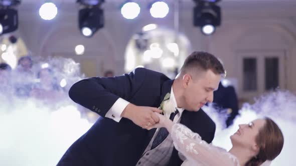 Caucasian Bride Groom Dancing First at the Wedding Party Newlyweds Embracing Happy Young Family