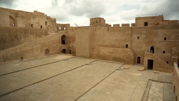 Panorama of the Ancient Ribat Fortress in Monastir, Tunisia. Old Yellow Bricks. View From Right To