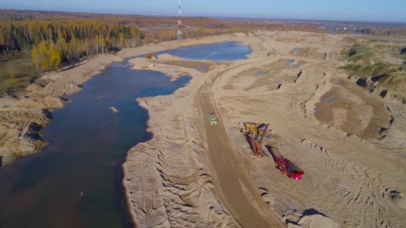 Excavator in the Sand Quarry