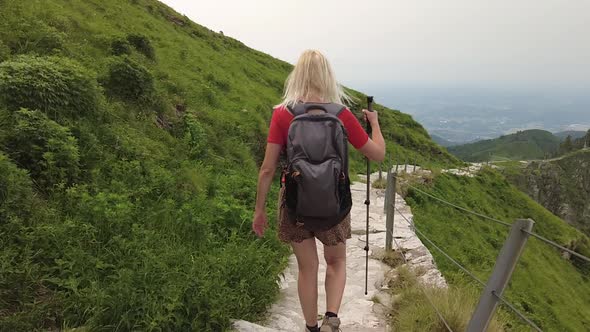 Tourist Girl Trekking on Monte Generoso