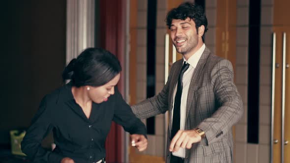 Men and Women Dance Happily at the Club