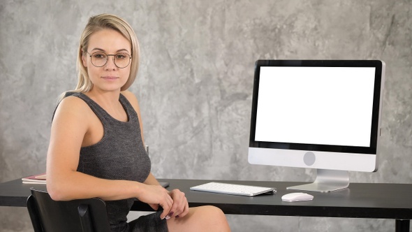 Smart Professional Woman Near Computer