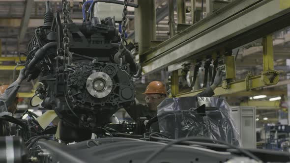 The car assembling plant and workers